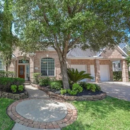 Rent this 4 bed house on 12472 Lago Bend Lane in Harris County, TX 77041