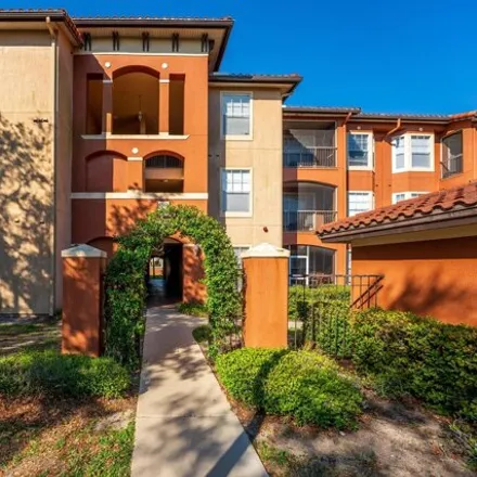 Buy this 2 bed condo on 5575 Arnold Palmer Drive in Orlando, FL 32811