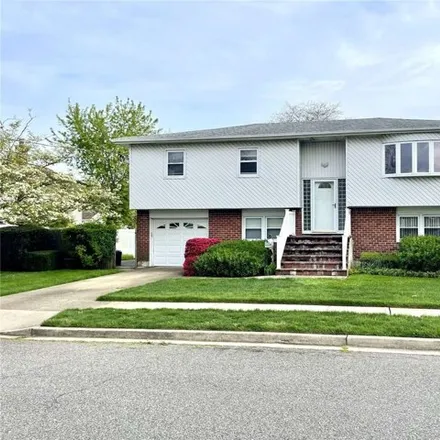 Buy this 4 bed house on 42 A Maple Street in Massapequa, NY 11758