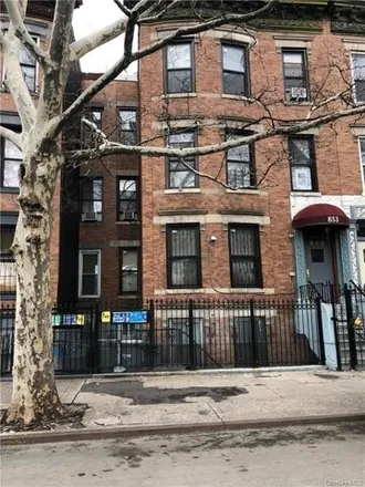 Buy this 12 bed house on 853 Bruckner Boulevard in New York, NY 10459