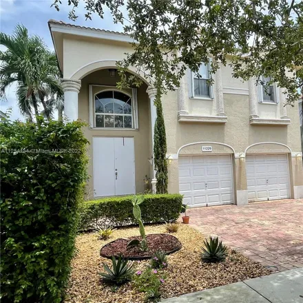 Rent this 4 bed house on 11235 Northwest 47th Lane in Doral, FL 33178