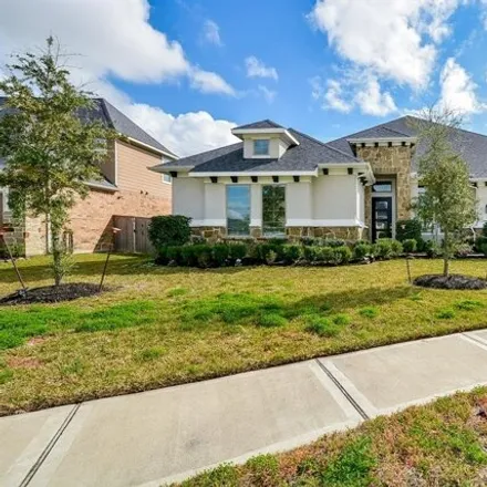 Rent this 4 bed house on 1499 Windy Thicket Lane in Katy, TX 77494