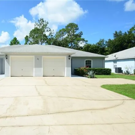 Rent this 3 bed house on 70 Eton Lane in Palm Coast, FL 32164