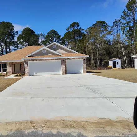 Buy this 4 bed house on 5101 Old Oak Road in Santa Rosa County, FL 32583