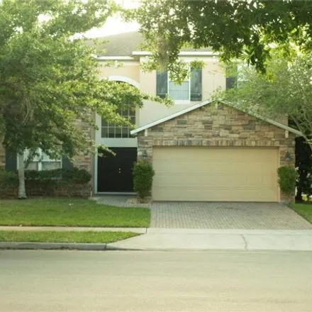 Rent this 5 bed house on 12954 Moss Park Ridge Drive in Orange County, FL 32832