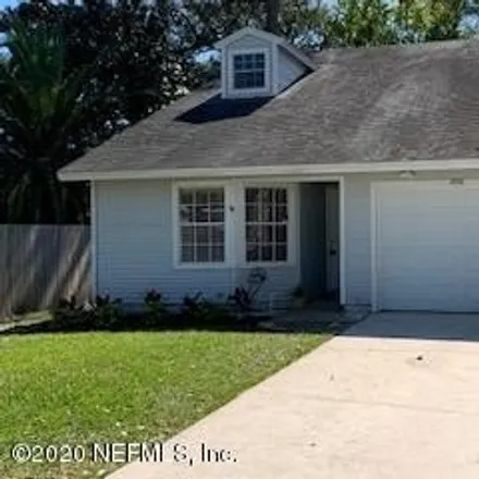 Rent this 3 bed townhouse on 4596 Wandering Oaks Court in Jacksonville, FL 32257