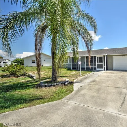 Buy this 2 bed house on 10707 Guava Tree Court in Lehigh Acres, FL 33936