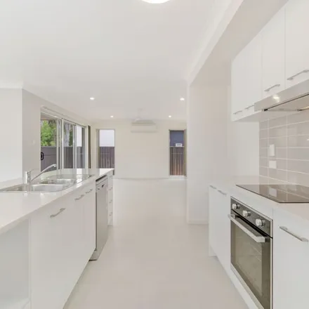 Rent this 4 bed apartment on 3 Beugina Close in Kenmore QLD 4069, Australia
