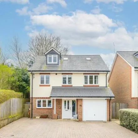 Buy this 4 bed house on Hawthorn Gardens in Caterham on the Hill, CR3 5HW