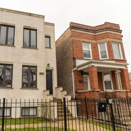 Buy this 3 bed house on 3514 North Lowell Avenue in Chicago, IL 60641