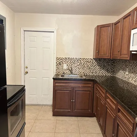Rent this 4 bed apartment on 1777 West 28th Street in Riviera Beach, FL 33404