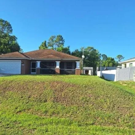 Buy this 3 bed house on 2805 14th St W in Lehigh Acres, Florida