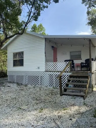 Buy this 2 bed house on 9548 Northeast 305th Terrace in Marion County, FL 32134
