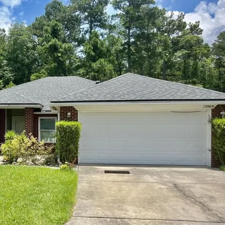 Rent this 3 bed house on 13969 Crestwick Dr E in Jacksonville, Florida