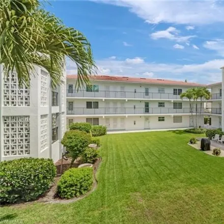 Rent this 2 bed condo on 5 High Point Cir W Apt 211 in Naples, Florida