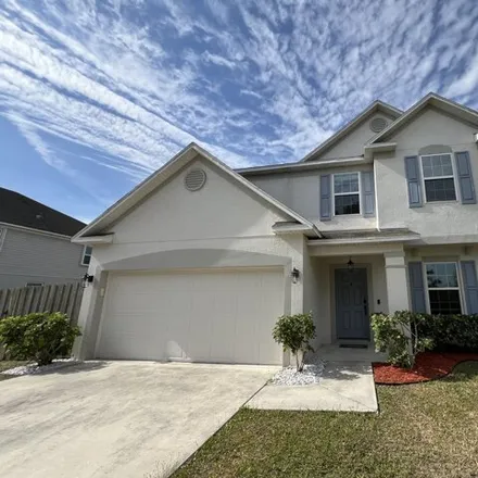 Buy this 3 bed house on 1398 Southwest Oriole Lane in Port Saint Lucie, FL 34953