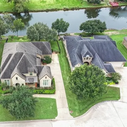 Buy this 5 bed house on 32489 Waterford Crest Drive in Weston Lakes, TX 77441
