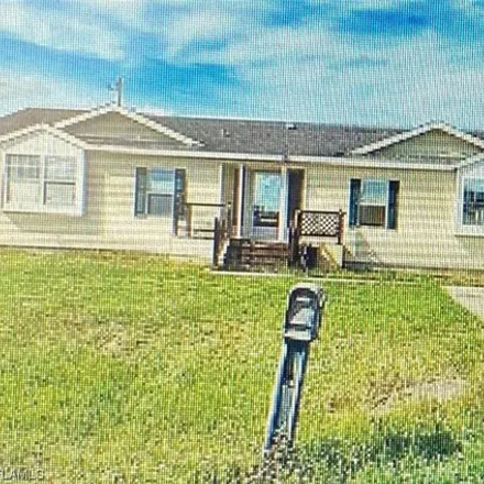 Buy this 3 bed house on 2063 Montana Circle in Port La Belle, Hendry County