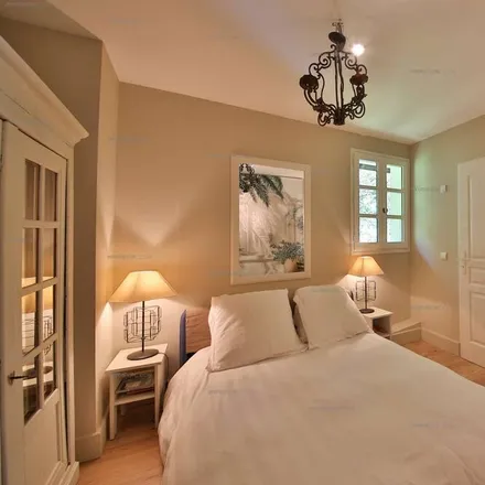 Rent this 8 bed house on Menthon-Saint-Bernard in Rue de la Poste, 74290 Menthon-Saint-Bernard