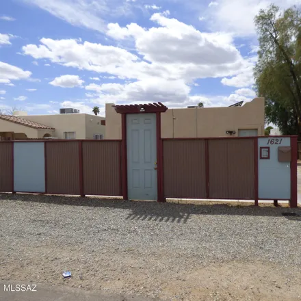 Rent this 3 bed house on 1621 North Dodge Boulevard in Tucson, AZ 85716