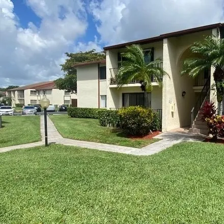 Rent this 2 bed condo on 265 Foxtail Drive in Greenacres, FL 33415