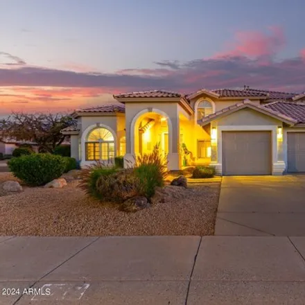 Buy this 5 bed house on 5717 West Soft Wind Drive in Glendale, AZ 85310