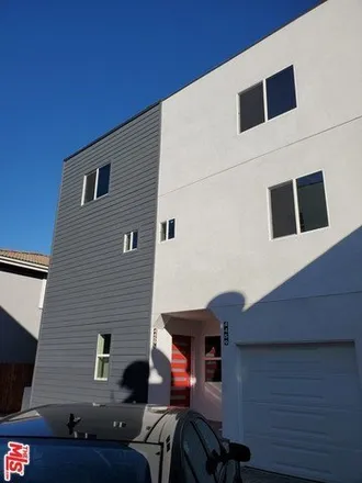 Rent this 4 bed townhouse on 4463 Rosewood Avenue in Los Angeles, CA 90004