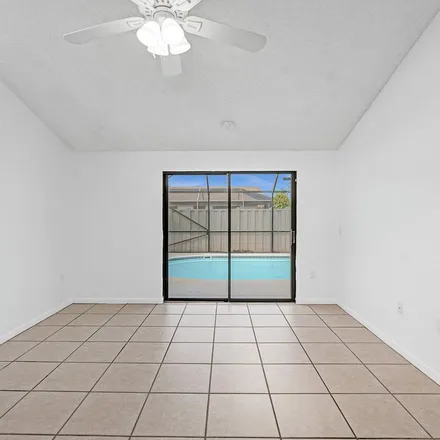 Rent this 3 bed apartment on 9997 Boca Gardens Trail in Palm Beach County, FL 33496