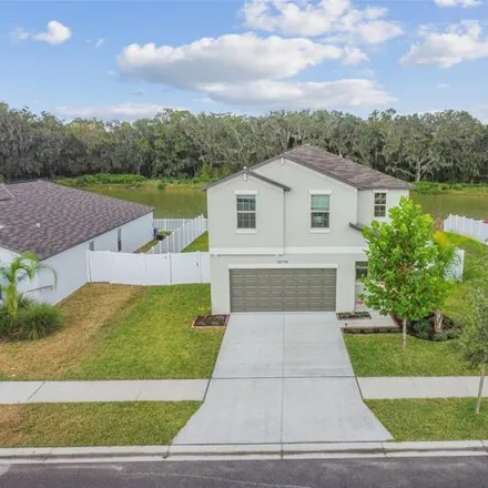 Buy this 4 bed house on 39774 Harmon Grove Ct in Zephyrhills, Florida