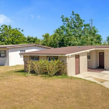 Buy this 4 bed house on 6223 Perrine Drive in Orange County, FL 32808