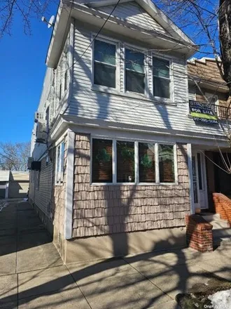 Buy this 5 bed house on 87-39 81st Avenue in New York, NY 11385