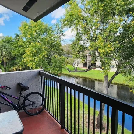 Rent this 2 bed apartment on 9961 Nob Hill Place in Sunrise, FL 33351