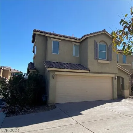 Rent this 4 bed house on 8703 Brindisi Park Avenue in Mountain's Edge, NV 89148
