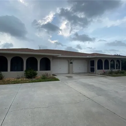 Rent this 3 bed house on 3657 Country Club Boulevard in Cape Coral, FL 33904