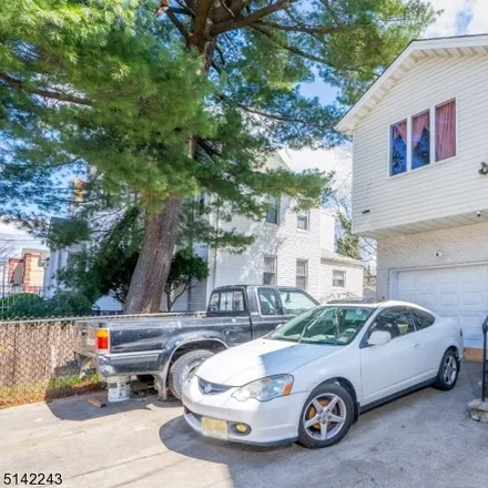 Buy this 6 bed townhouse on 198 Nye Avenue in Newark, NJ 07112