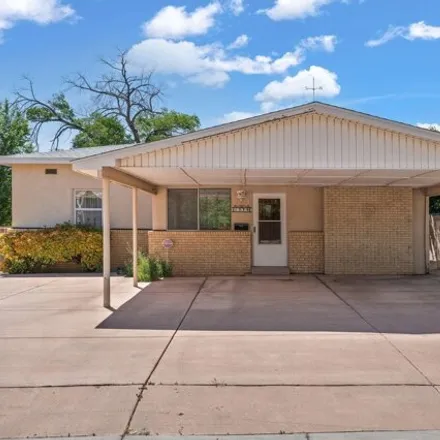 Buy this 4 bed house on 1332 Richmond Drive Northeast in Albuquerque, NM 87131