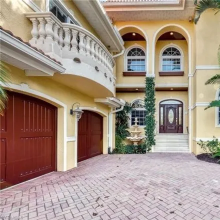 Buy this 4 bed house on 1867 Kingfish Road in Naples, FL 34102