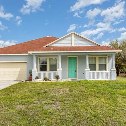 Buy this 4 bed house on San Filippo Drive Southeast in Palm Bay, FL 32909