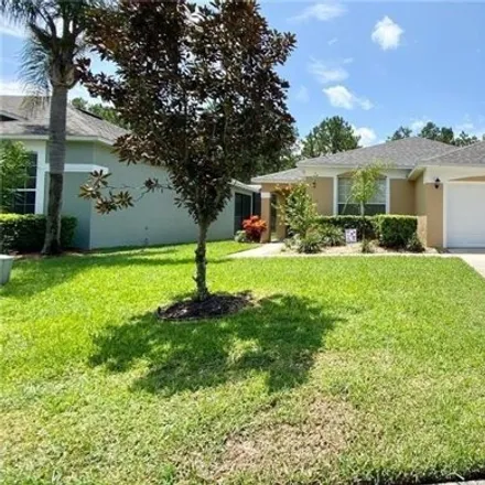 Rent this 4 bed house on 656 Casterton Circle in Polk County, FL 33897