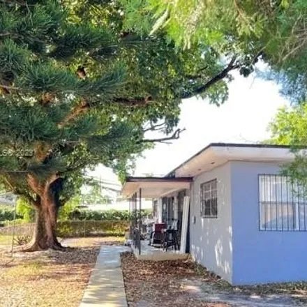 Buy this 7 bed house on 630 Oriental Blvd in Opa Locka, Florida