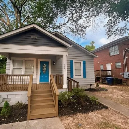 Buy this 4 bed house on 306 Atwood St SW in Atlanta, Georgia