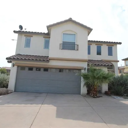 Rent this 4 bed house on 1927 Sunset Village Circle in Henderson, NV 89014