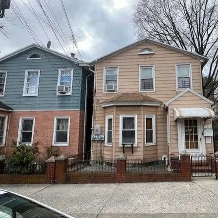 Buy this 5 bed house on 44-32 64th Street in New York, NY 11377