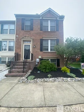 Rent this 2 bed townhouse on 11 Vinca Drive