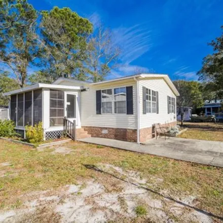 Buy this studio apartment on 8974 Bonaparte Drive Southwest in Shady Forest, Brunswick County