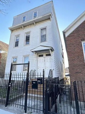 Buy this 5 bed house on 3120 South Normal Avenue in Chicago, IL 60609