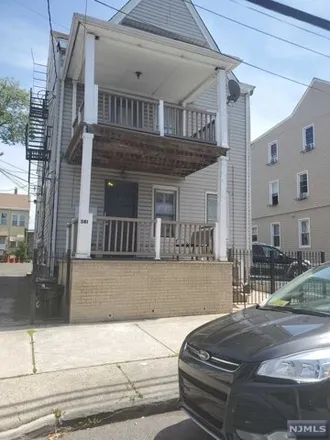 Buy this 6 bed house on 381 East 21st Street in Paterson, NJ 07513