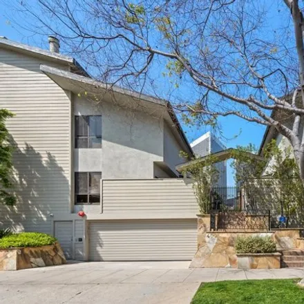 Rent this 3 bed house on 407 South Spalding Drive in Beverly Hills, CA 90212