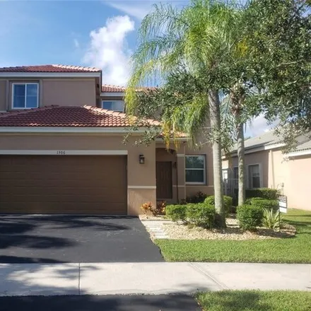 Rent this 4 bed house on 1306 Banyan Way in Weston, FL 33327