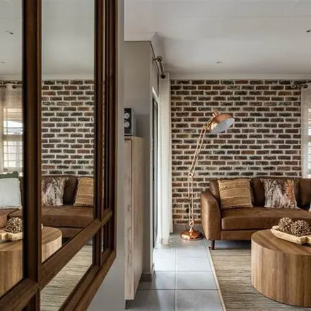 Rent this 3 bed apartment on Barrumba Pub & Grill in Boekenhoutkloof Street, Claremont